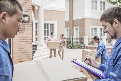 Moving team handling a home move in a Crouch End residential street