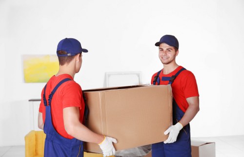 Unpacking boxes in a new Crouch End home