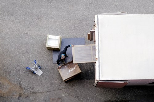 Local removal van moving through North London streets
