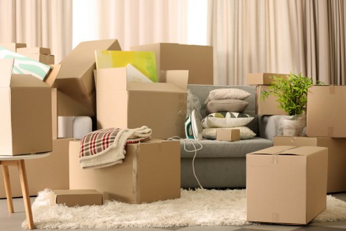 Packed boxes and furniture ready for a removals service