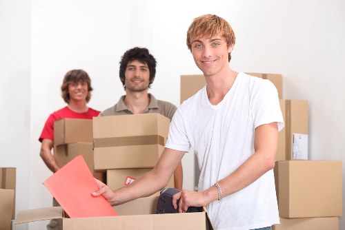 Business relocation setup with office boxes and workplace essentials