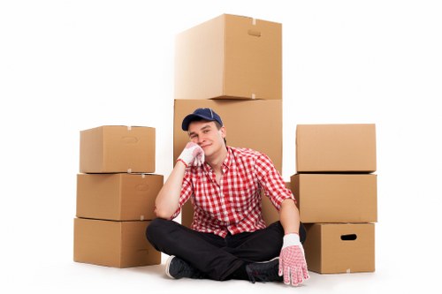 Furniture being carried from a Crouch End flat with stair access